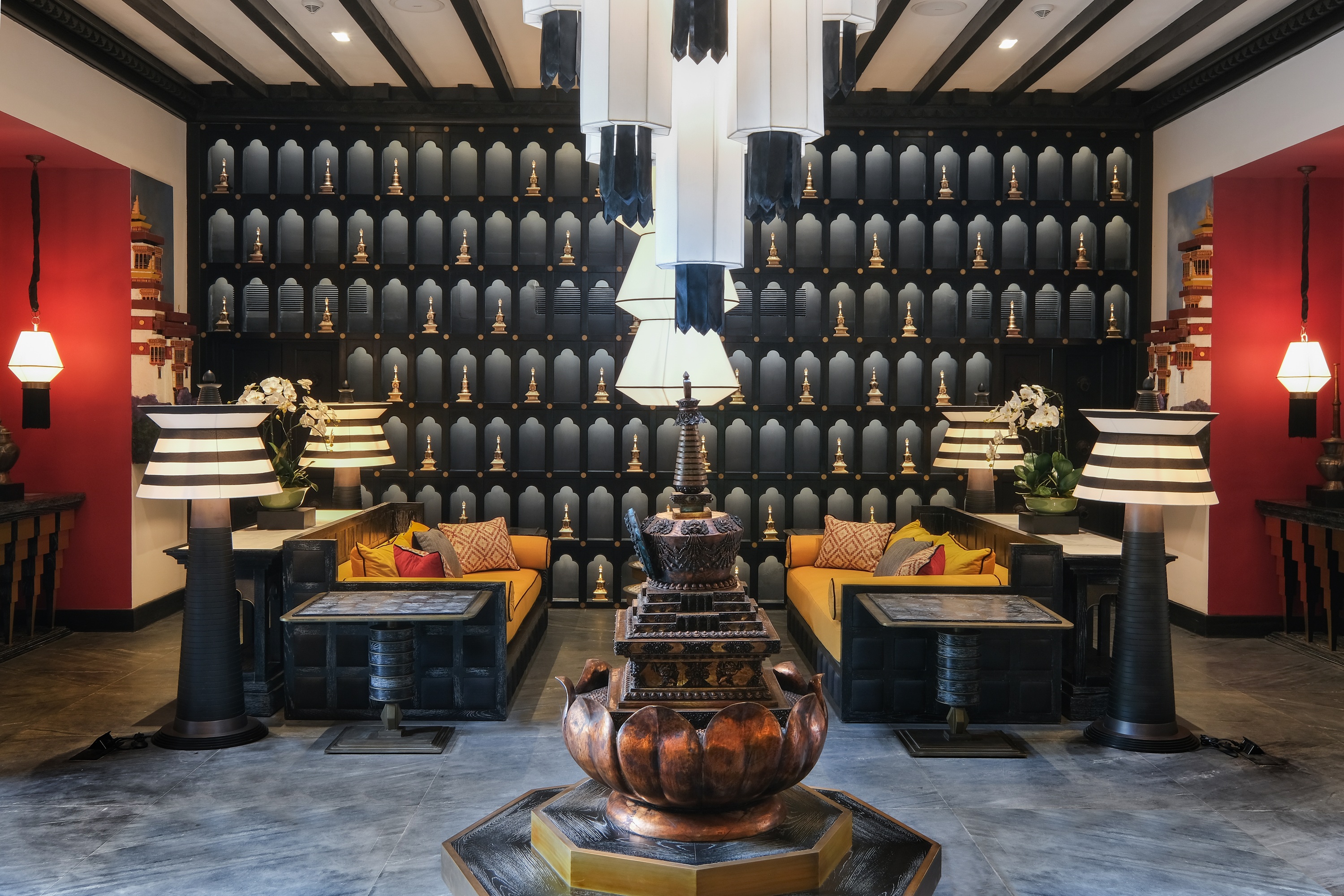 Resort lobby with traditional centerpiece at Pemako Punakha