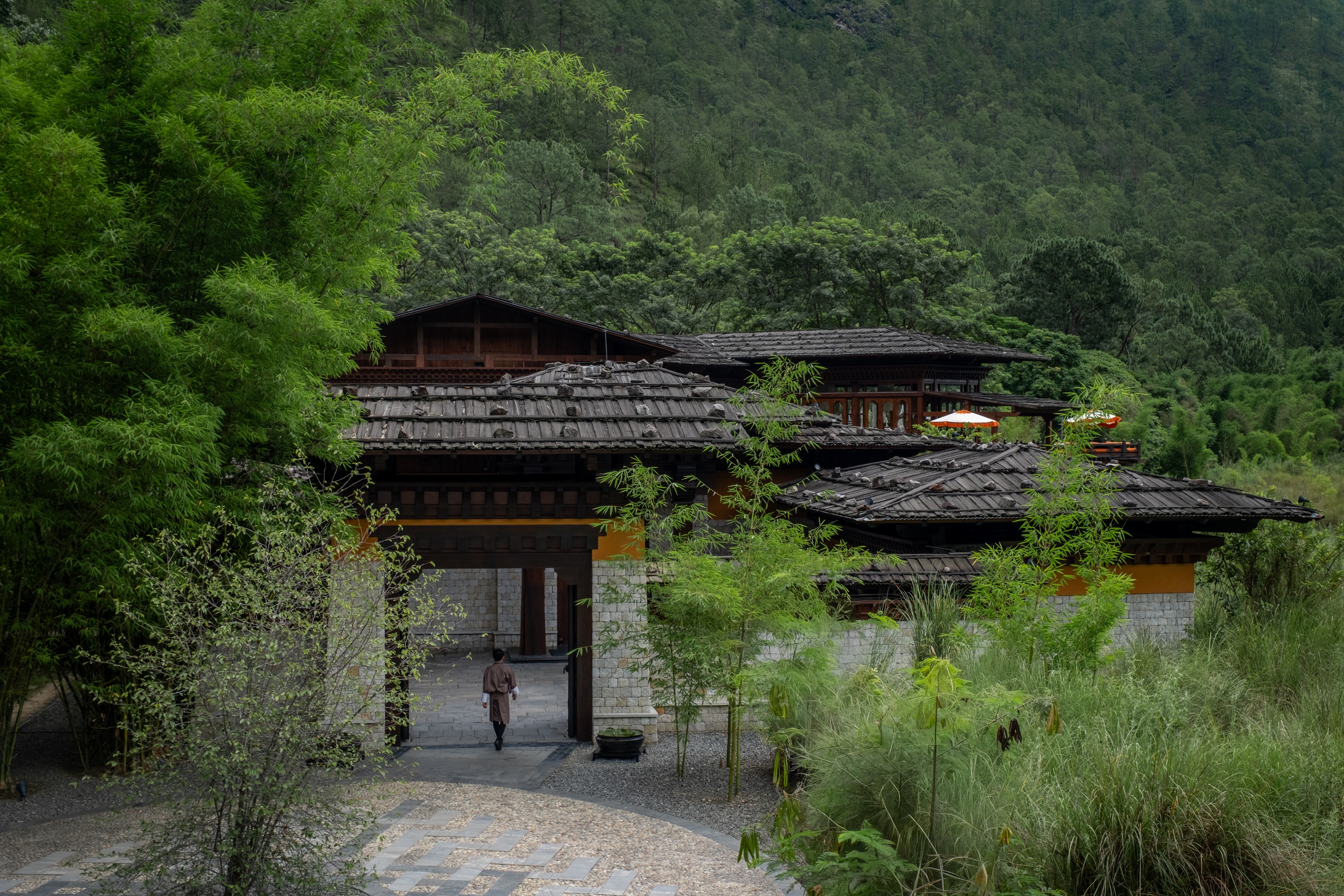 Traditional stone gateway at Pemako Punakha
