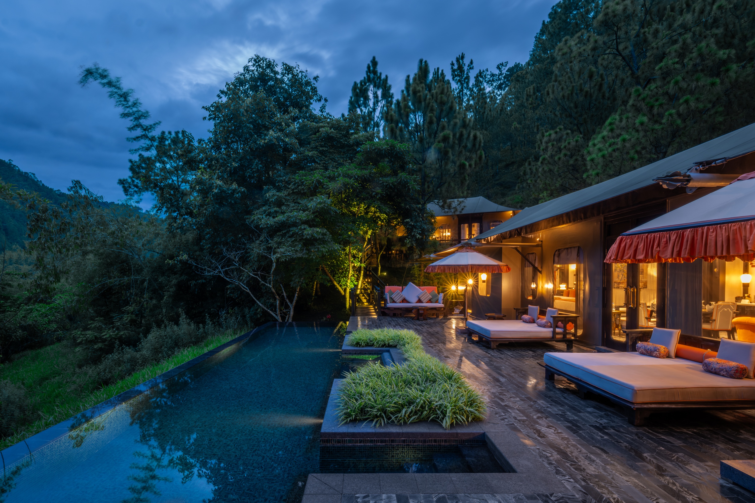 Villa pool at dusk at Pemako Punakha
